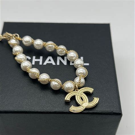 chanel double chain bracelet|chanel pearl bracelet with logo.